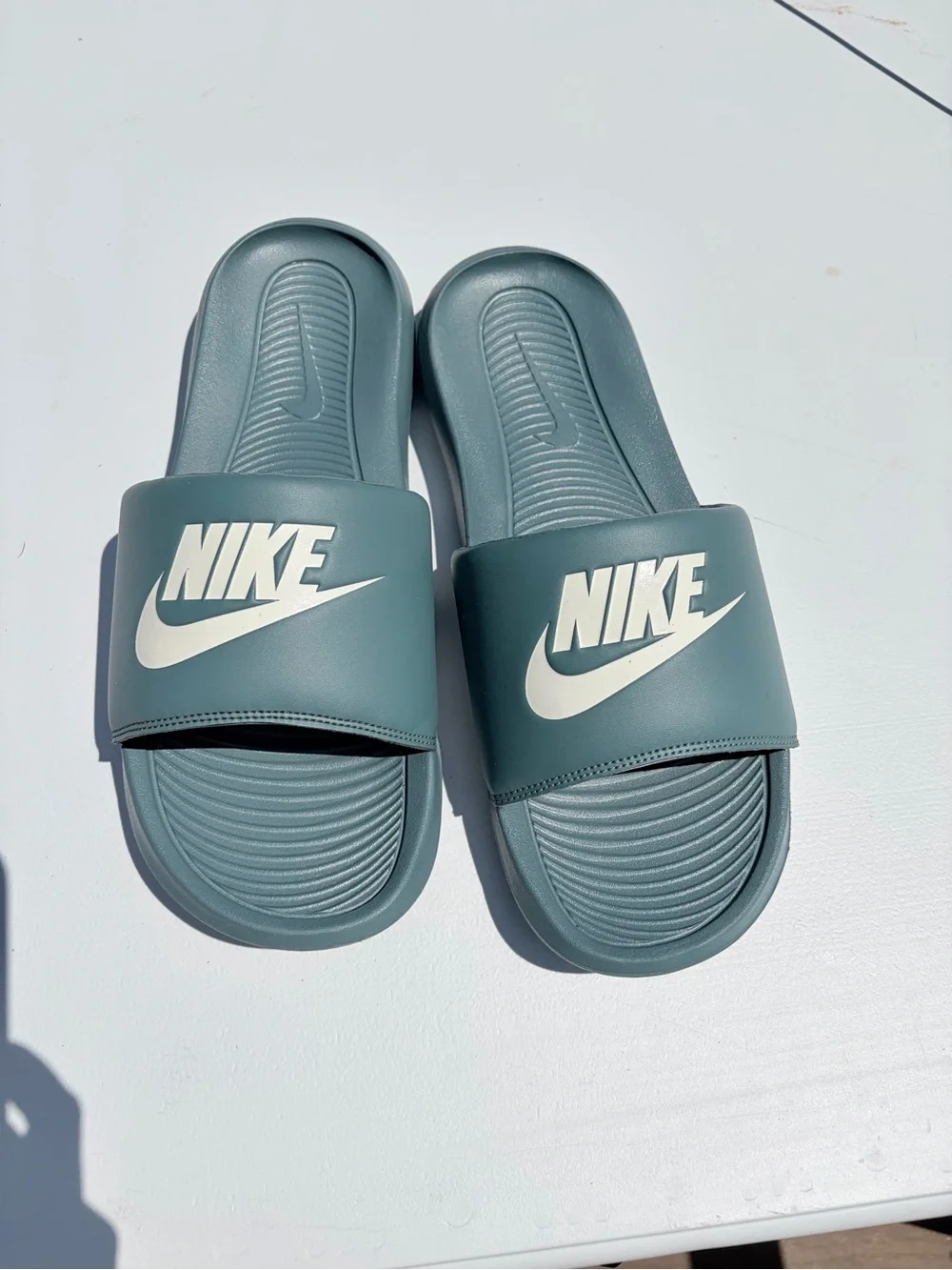 Nike Slide Sandals in Blue-Green with White Logo